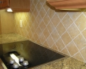 simple diagonal tile kitchen backsplash